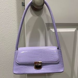 Purple faux leather shoulder bag from Nasty Gal